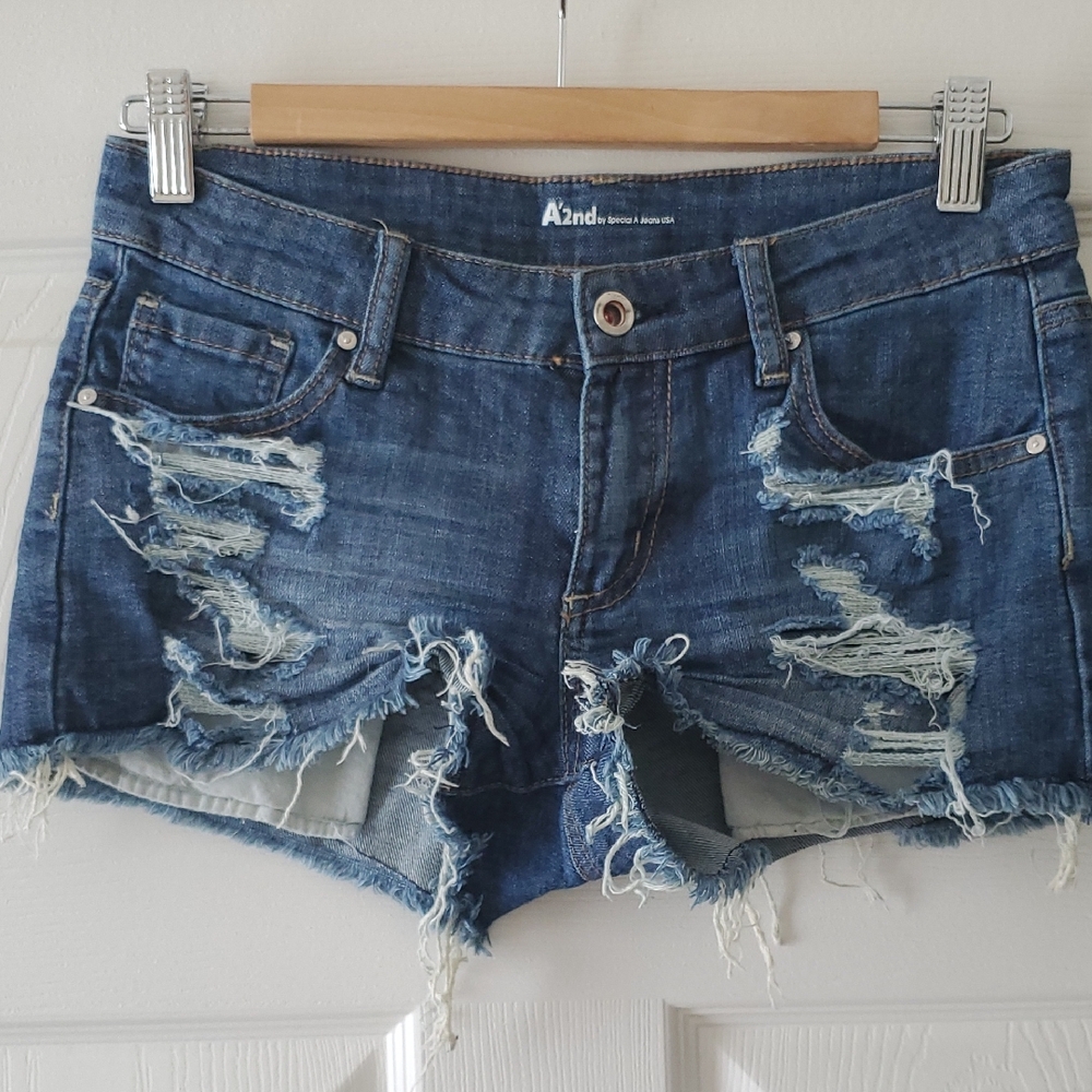 Women's Distressed Blue Denim Shorts.